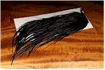 Hareline Dubbin Dyed Black Saddle