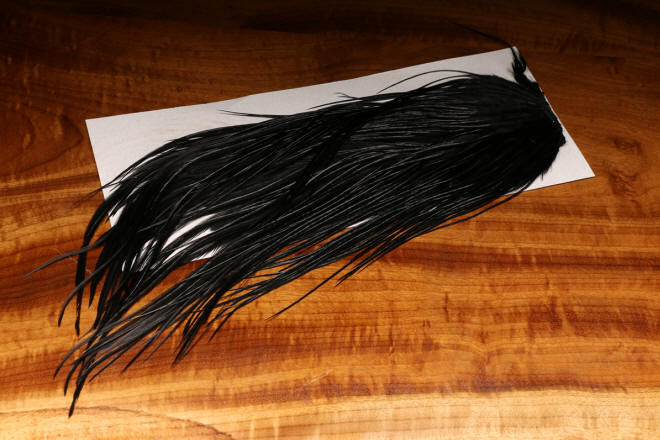 Hareline Dubbin Dyed Black Saddle